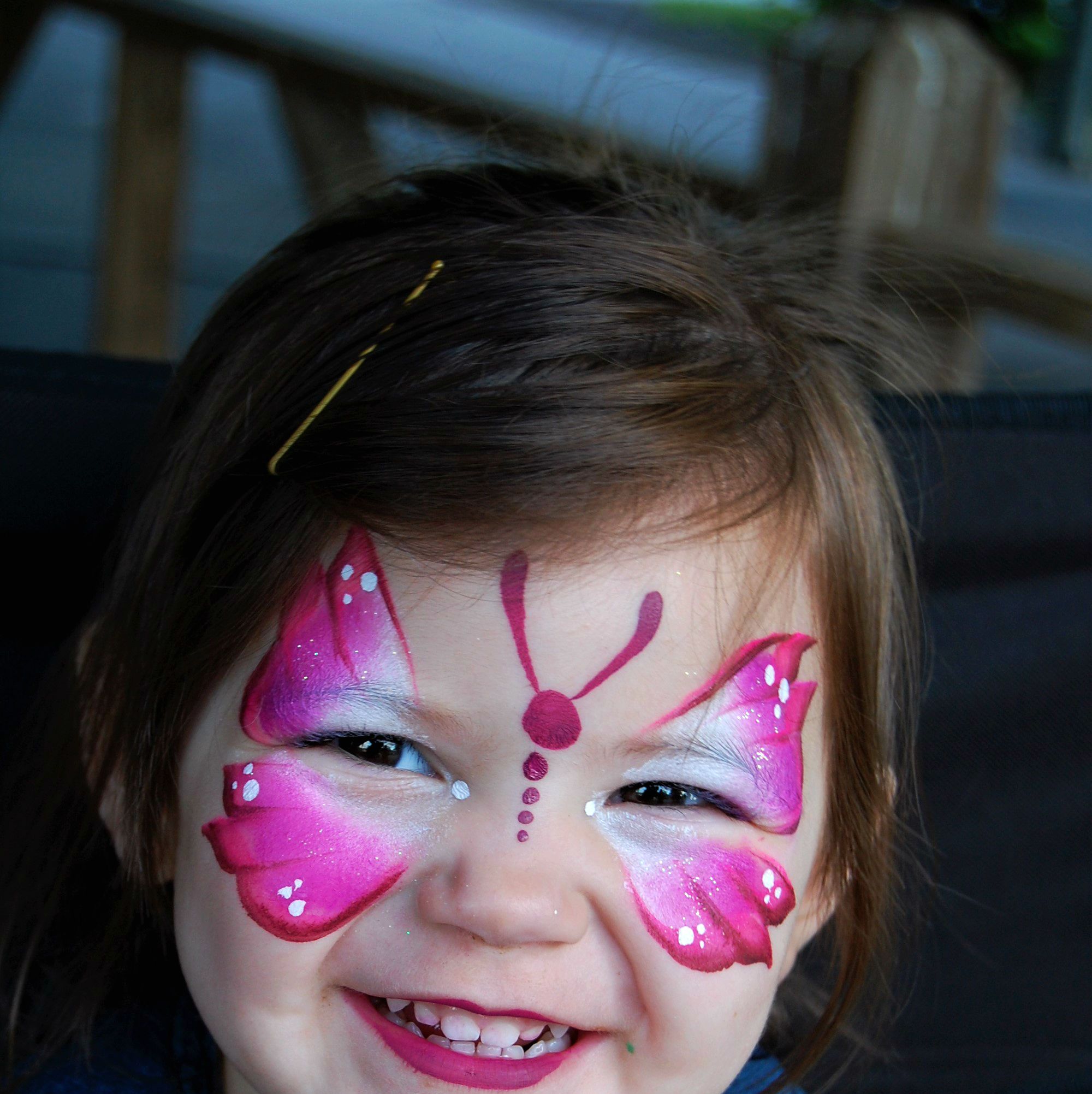 easy butterfly face painting on cheek