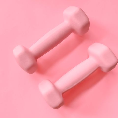 pink dumbbells on pink background