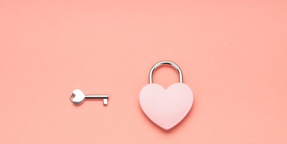 pink heart shape padlock and key