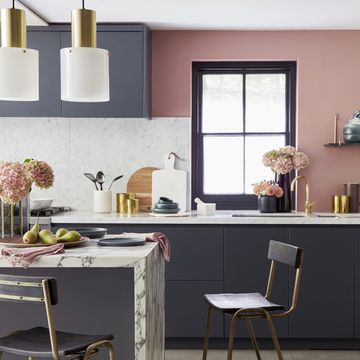touches of gold, marble and wood with accents of plum and mulberrypale pink combines beautifully with marble worktops and deep grey units to create a kitchen that looks sleek and smartwall painted in blush, £435025l, little greene lights, £319 each, original btc stools, £95 each, rockett st george on island vase, £18, debenhams platter, £20, habitat napkins, £25, design vintage bowl, £10 plate, £10 both habitat on worktop bowl, £20, habitat utensil pot, £35, john lewis brass pots, £16 for two wood board, £35 round marble board, £50 all debenhams blue bowls, from £6 each, habitat paddle board, £3840, rockett st george pestle and mortar, £48, graham  green black vase, £18, debenhams tall vase, £6990, villeroy  boch