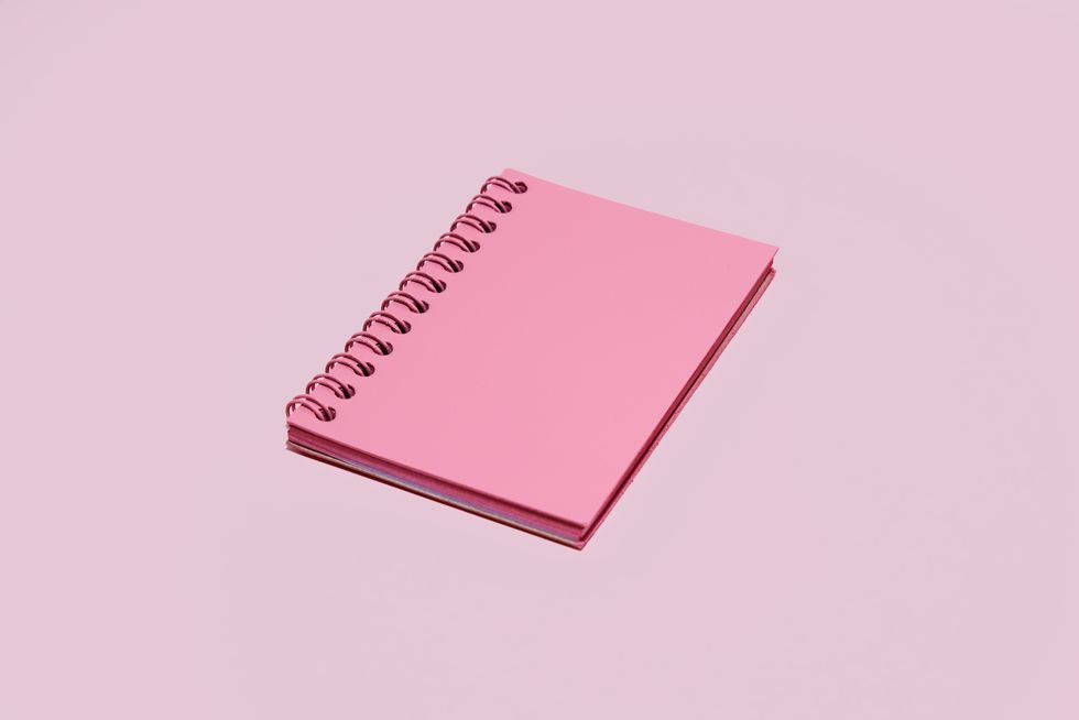 pink note pad on pink background