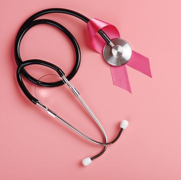 pink ribbon and stethoscope on pink background breast cancer awareness concept