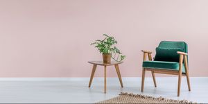 Pink room with green armchair