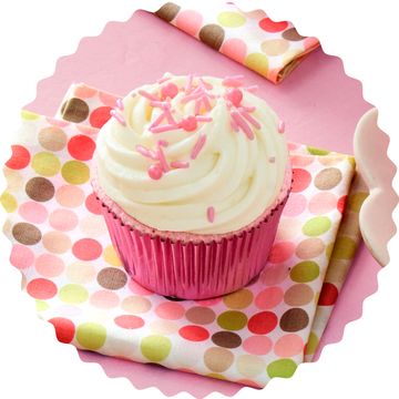 a cupcake with pink frosting