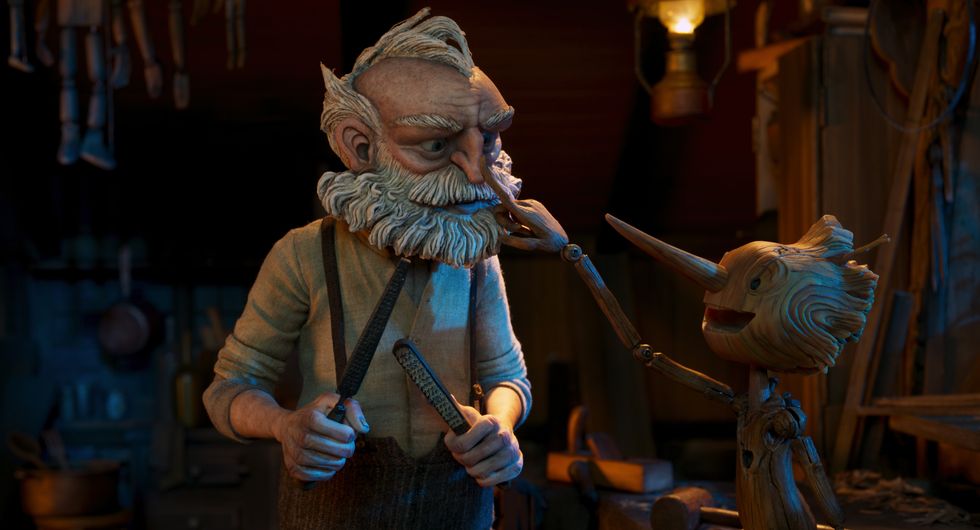 guillermo del toro's pinocchio l r gepetto voiced by david bradley and pinocchio voiced by gregory mann cr netflix © 2022