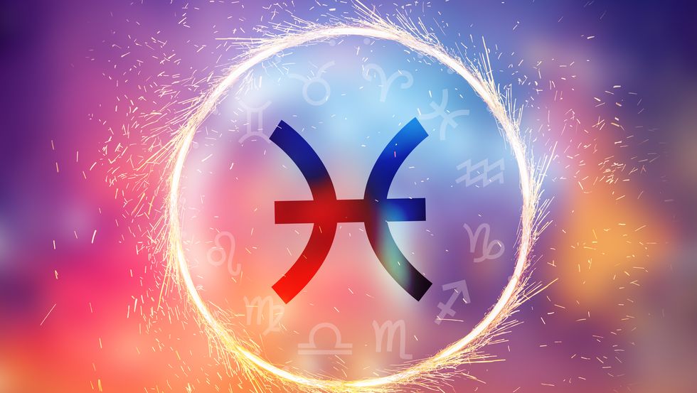 pisces symbol on a colorful background light