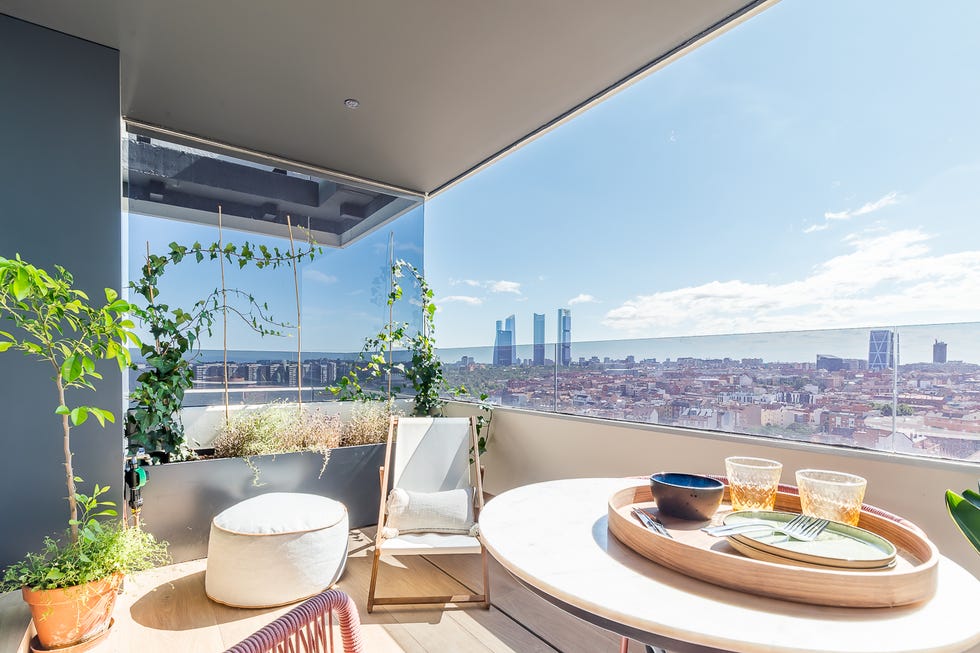 terraza con muebles de exterior