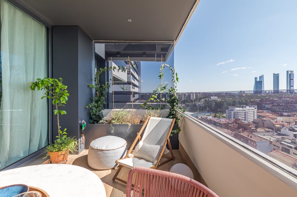 terraza con muebles de exterior