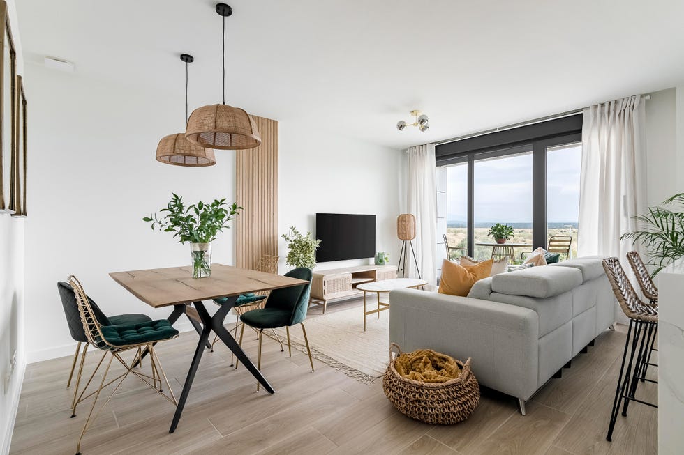 salón comedor de diseño nórdico con vistas a la terraza