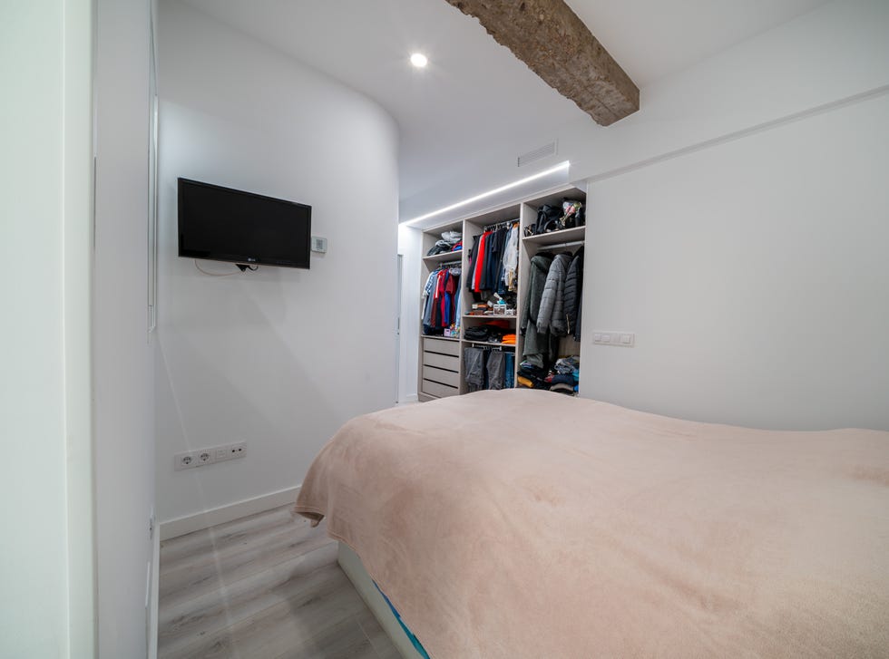 dormitorio con vestidor integrado