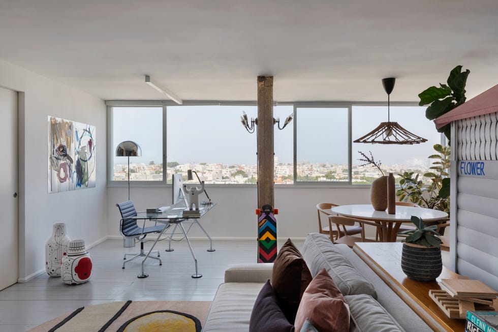 salón de diseño moderno con comedor y despacho