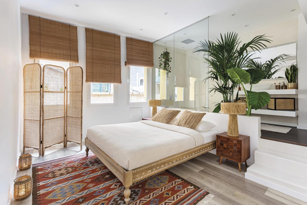 piso industrial y tropical dormitorio con baño integrado