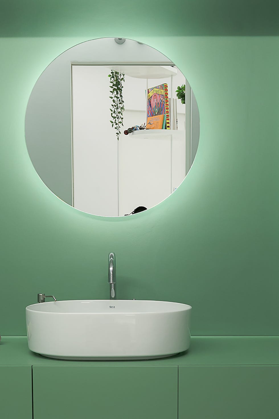 baño de color verde y diseño contemporáneo