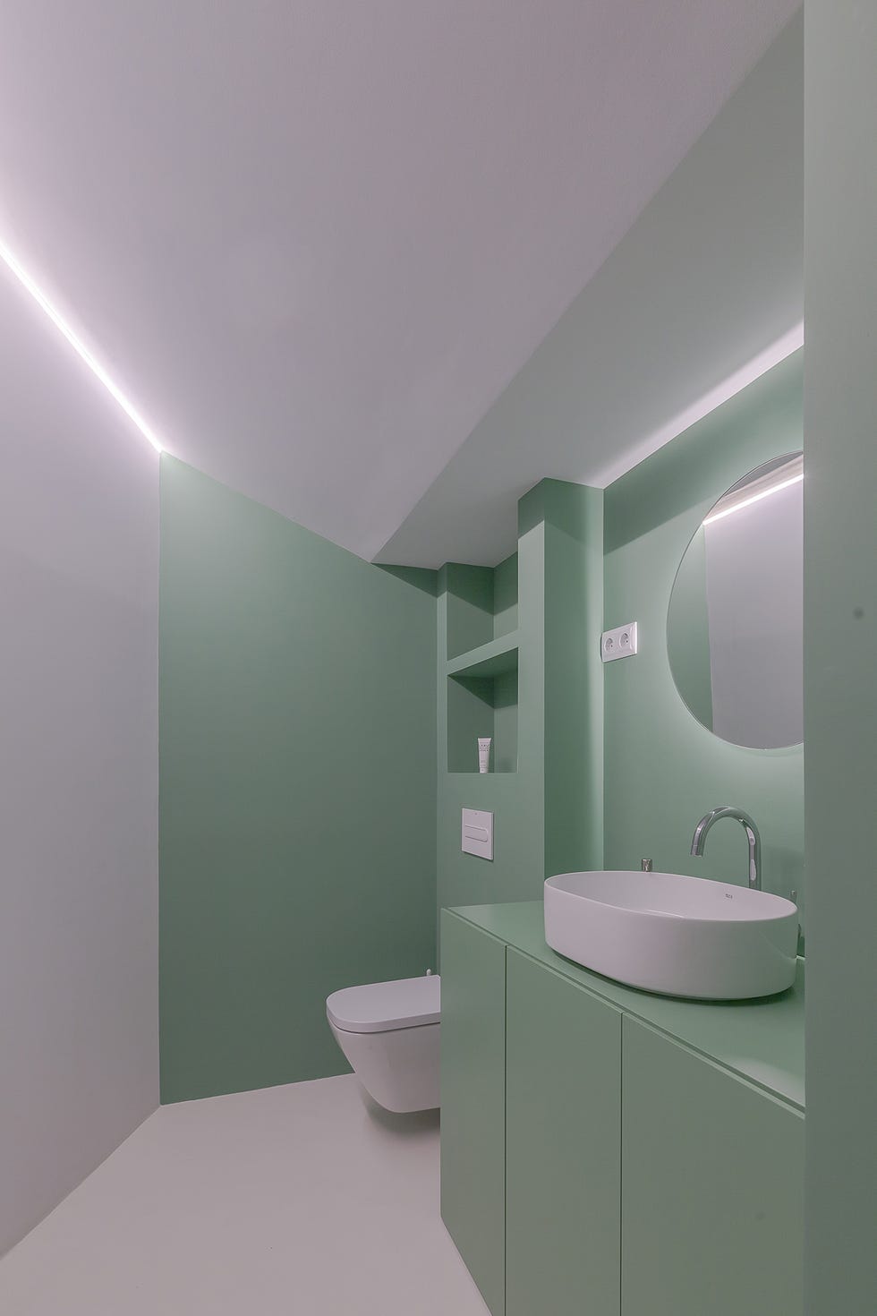 baño de color verde y diseño contemporáneo