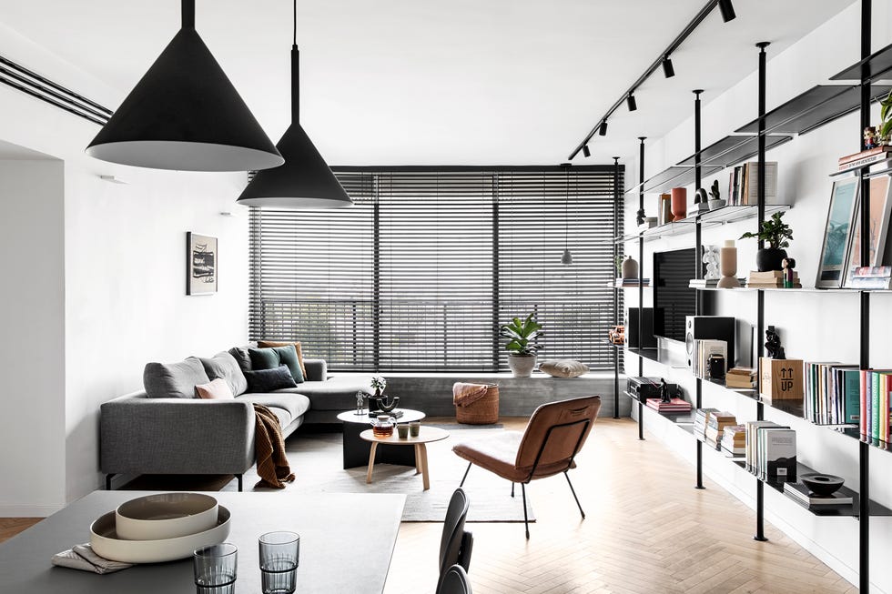 salón moderno de estilo minimalista en blanco y gris