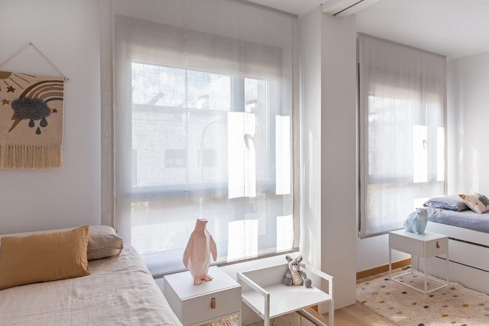 habitación infantil con dos camas