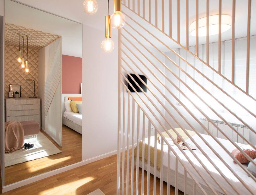 dormitorio chic con celosía como divisor de ambientes