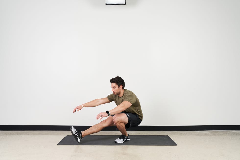 trainer ian finestein performing a series of pistol squat exercises