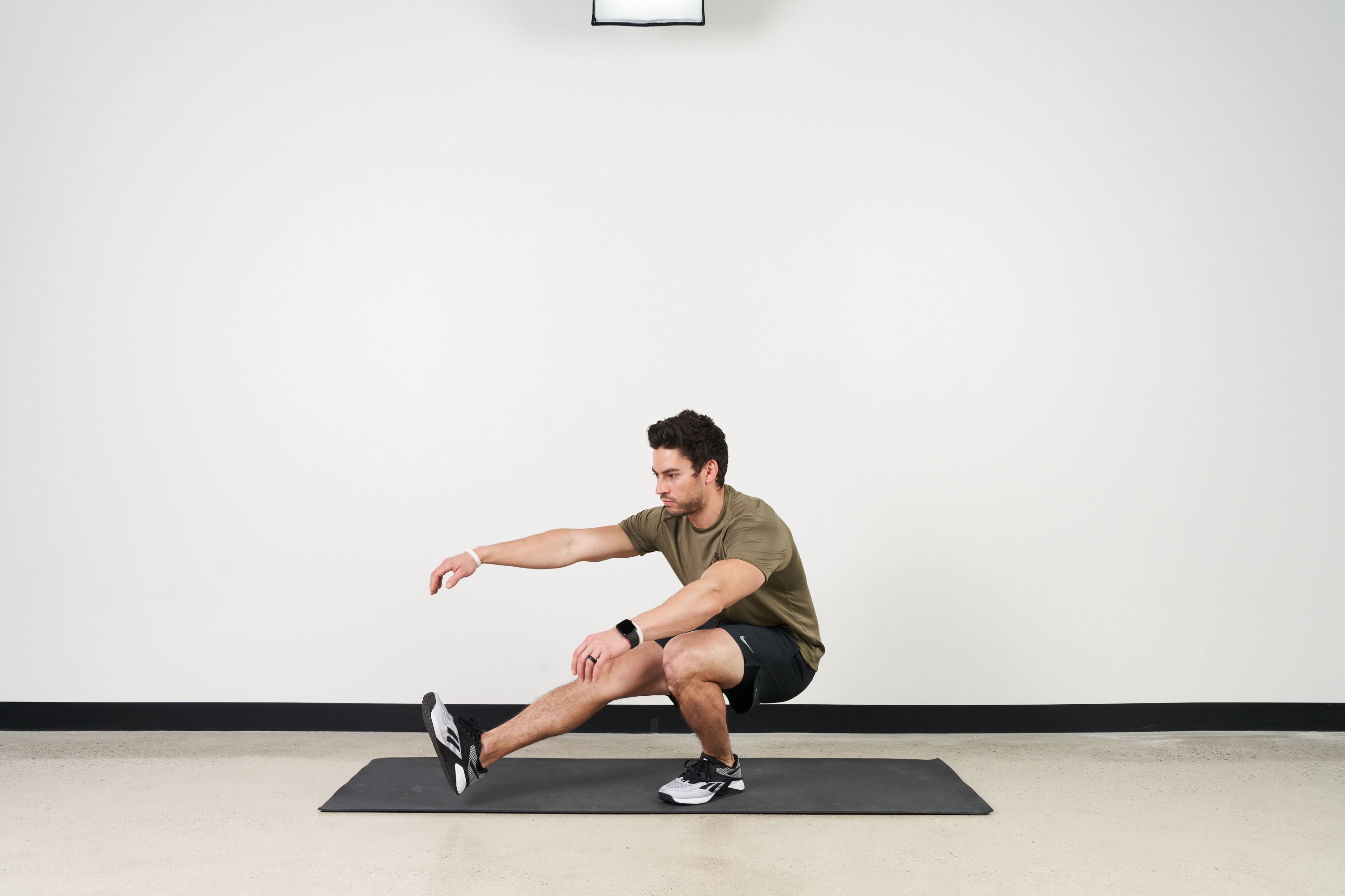 Boost Your Fitness with Heel Click Squats