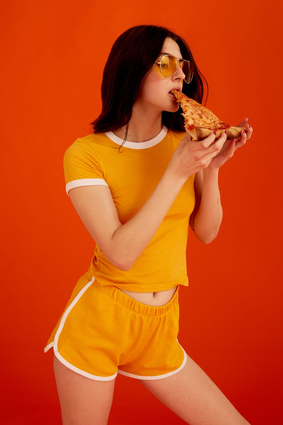 Thigh, Yellow, Leg, Orange, Human leg, Waist, Black hair, Photo shoot, Abdomen, Photography, 