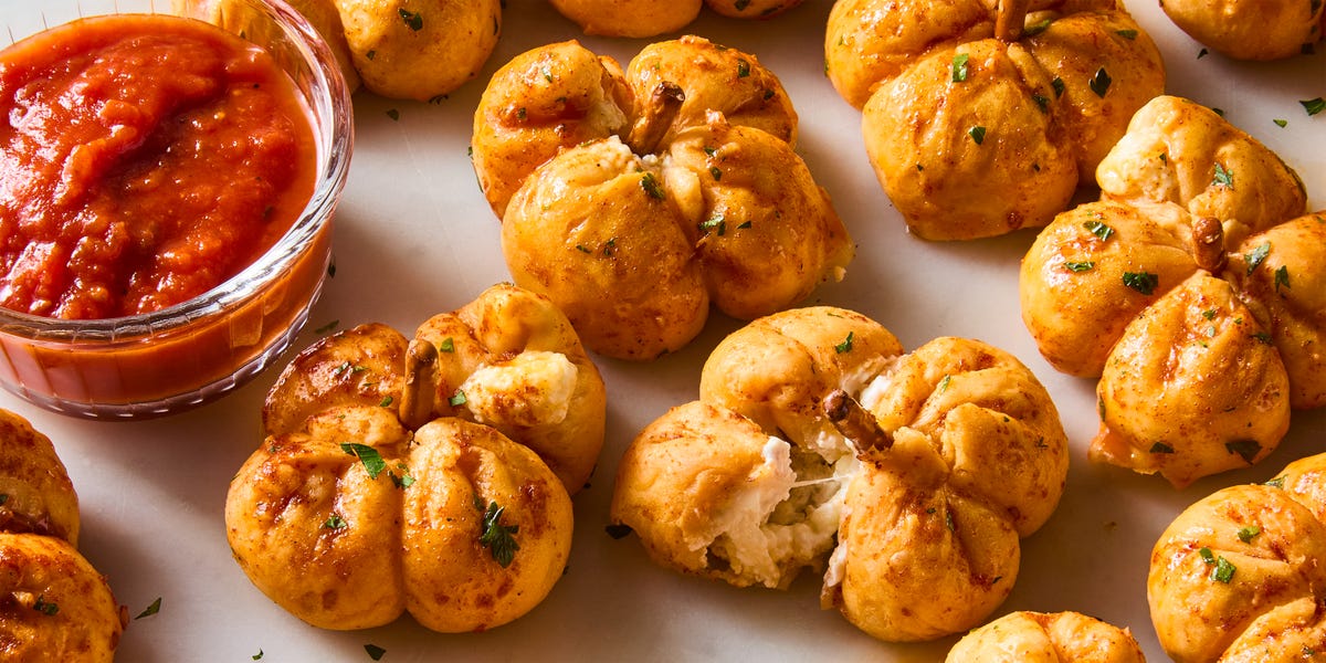 preview for Pizza-Stuffed Pumpkins Are Perfect Party Snack-O'-Lanterns