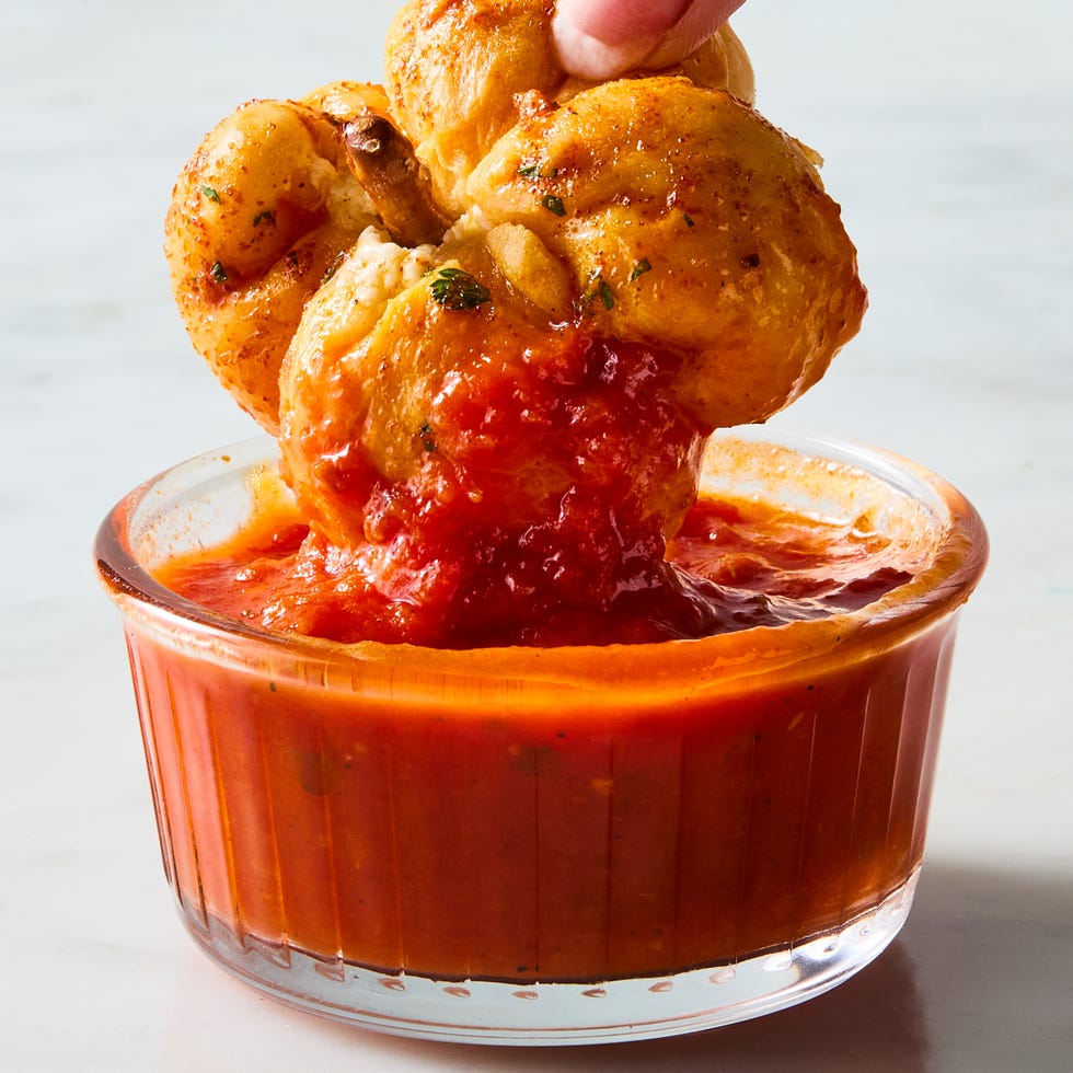 mini pumpkins made out of pizza dough stuffed with cheese