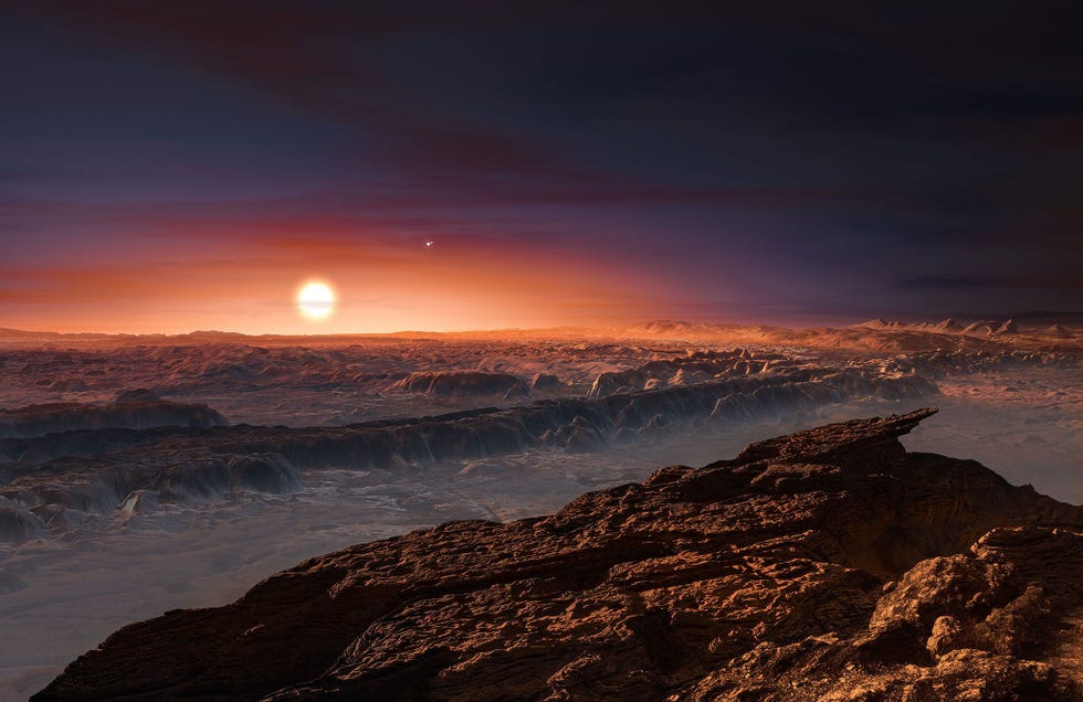 In deze illustratie baadt het oppervlak van de exoplaneet Proximab in het rode schijnsel van de ster Promixa Centauri