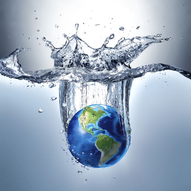 planet earth splashing into water