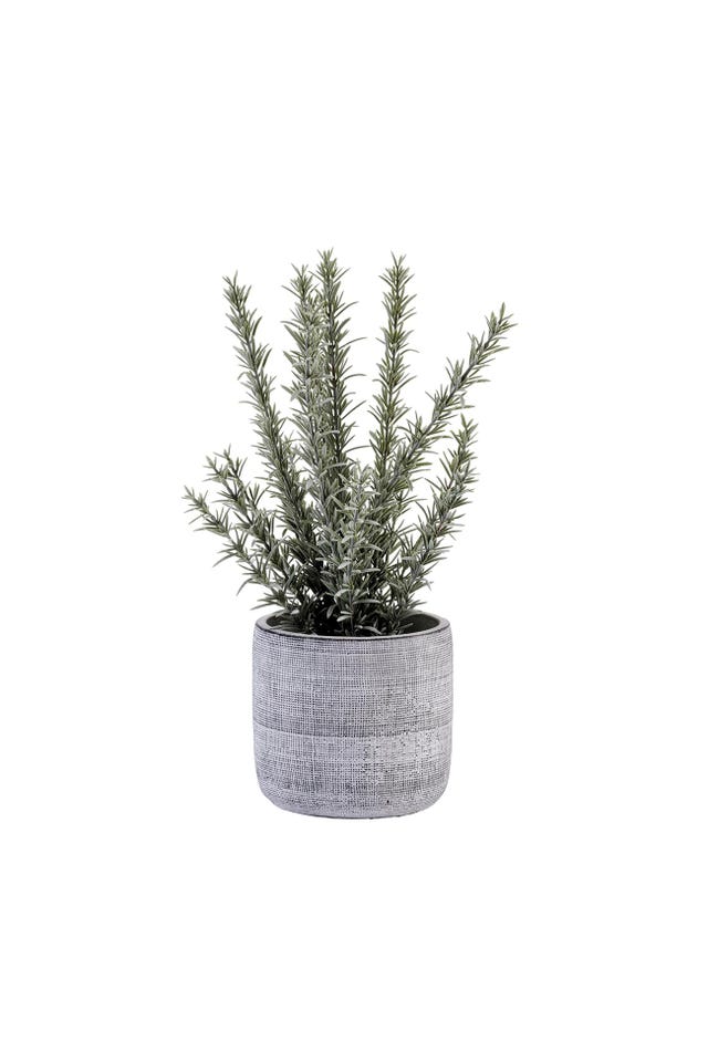 planta artificial con maceta gris cement