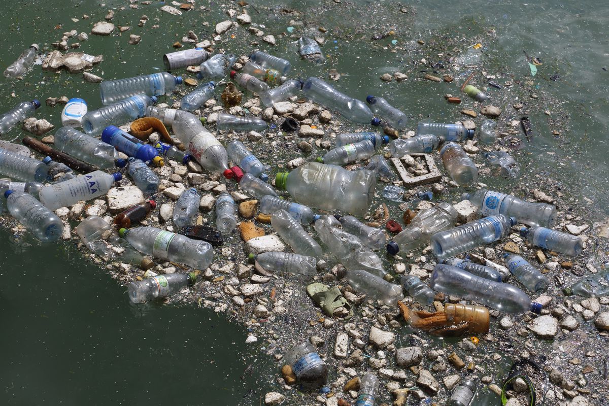 Plastic bottles & garbage floating in Indian Ocean.