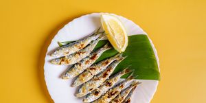 plate of freshly cooked grilled sardines