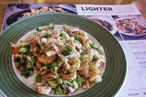 A plate of shrimp wonton stir fry from Applebee's Neighborhood Grill and Bar.