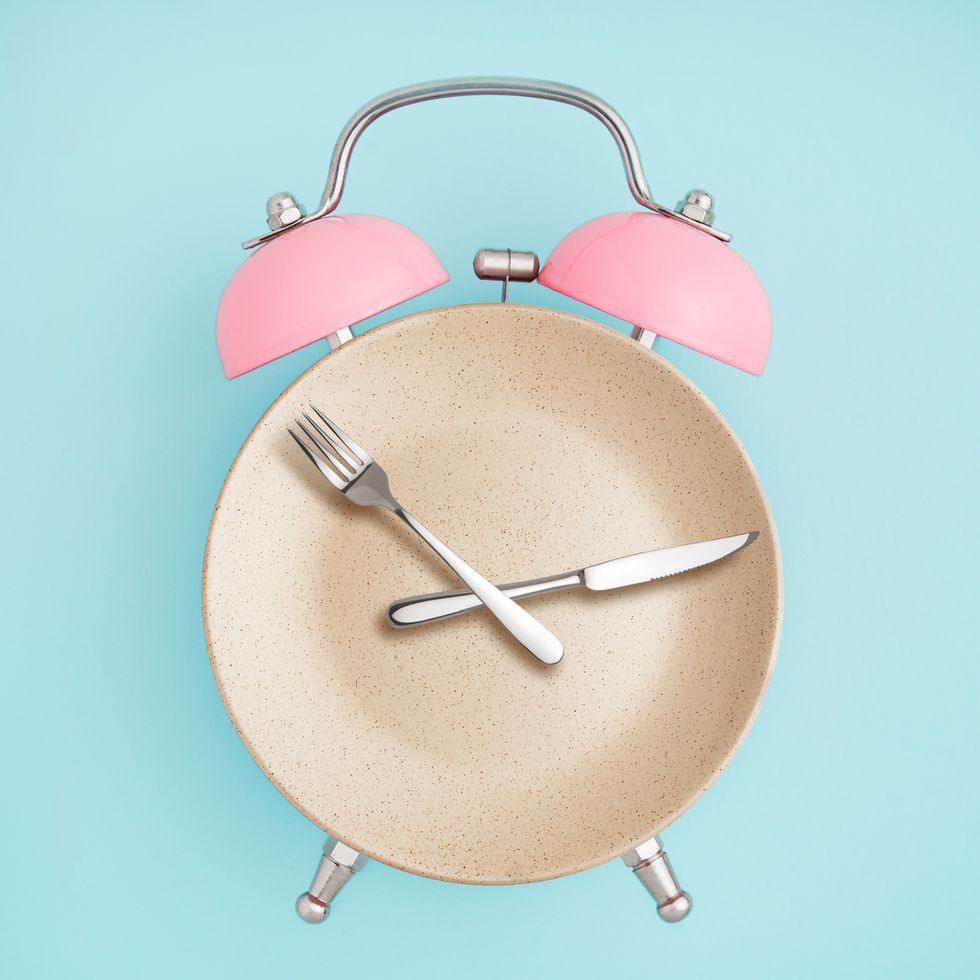 alarm clock timer with a plate and utensils in place of the numbers and hands