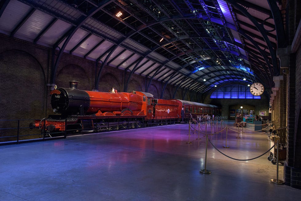 Transport, Railway, Locomotive, Vehicle, Sky, Train, Architecture, Train station, Building, Tourist attraction, 