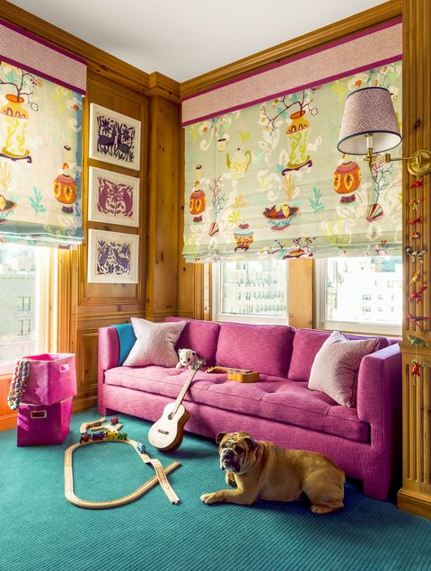 wood paneled library converted into a kid's playroom by designer bruce shostak hot pink, turquoise, and raspberry accents child's room, dog
