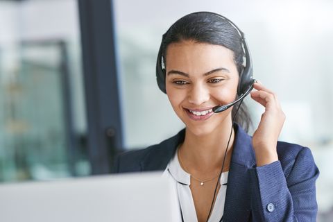 jobs for stay at home moms - woman talking on a phone headset
