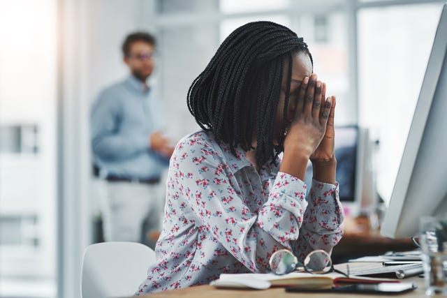 millennial burnout -  woman looking burned out