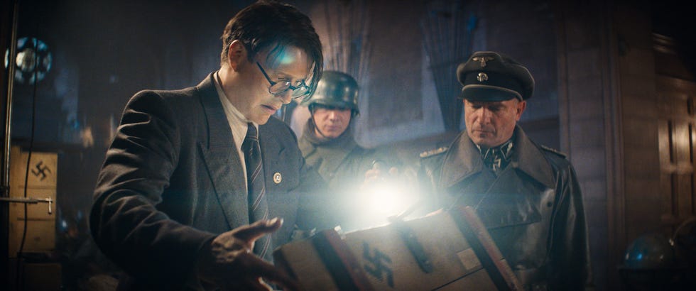 clockwise from right colonel weber thomas kretschmann and doctor jürgen voller mads mikkelsen in lucasfilm's ij5 ©2022 lucasfilm ltd tm all rights reserved