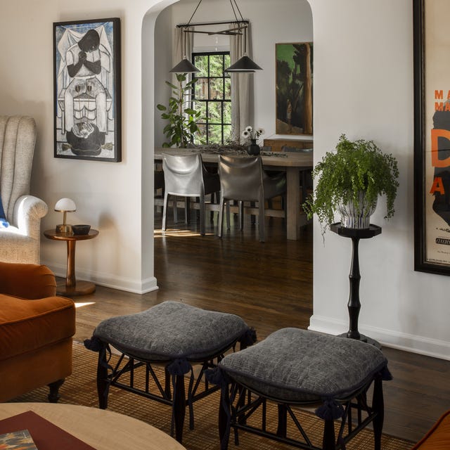 living room, white walls, orange couch