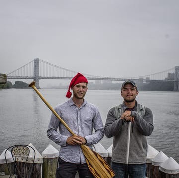 The author, left, and friend Tim Harper, on dry land again.