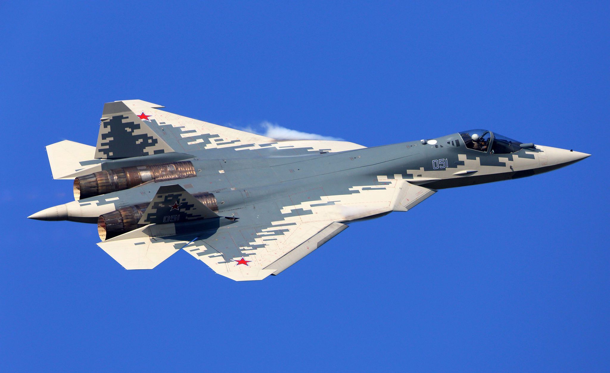 2b9c409 su 57 jet fighter of the russian air force against a blue sky