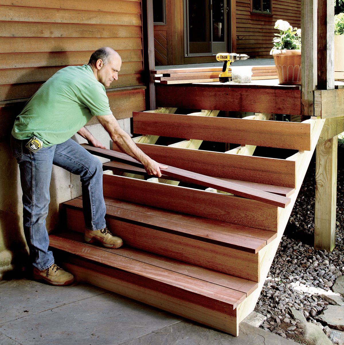 Wood, Hardwood, Lumber, Porch, Bench, Wood stain, Furniture, Stairs, Floor, Outdoor furniture, 