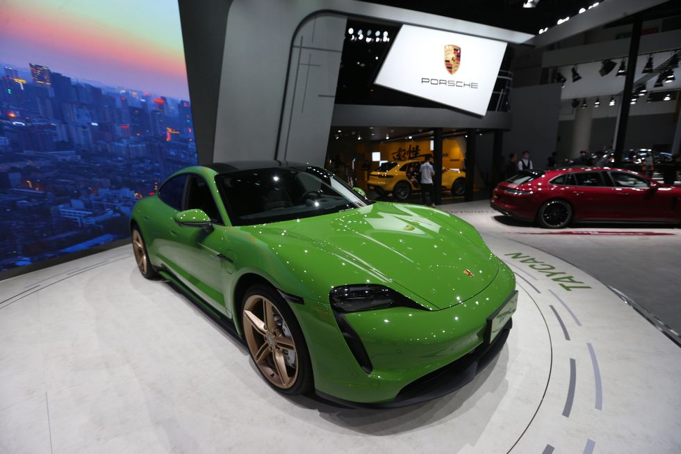 chengdu, china   august 26 a porsche taycan electric sports car is on display during chengdu motor show 2022 at western china international expo city on august 26, 2022 in chengdu, sichuan province of china photo by vcgvcg via getty images