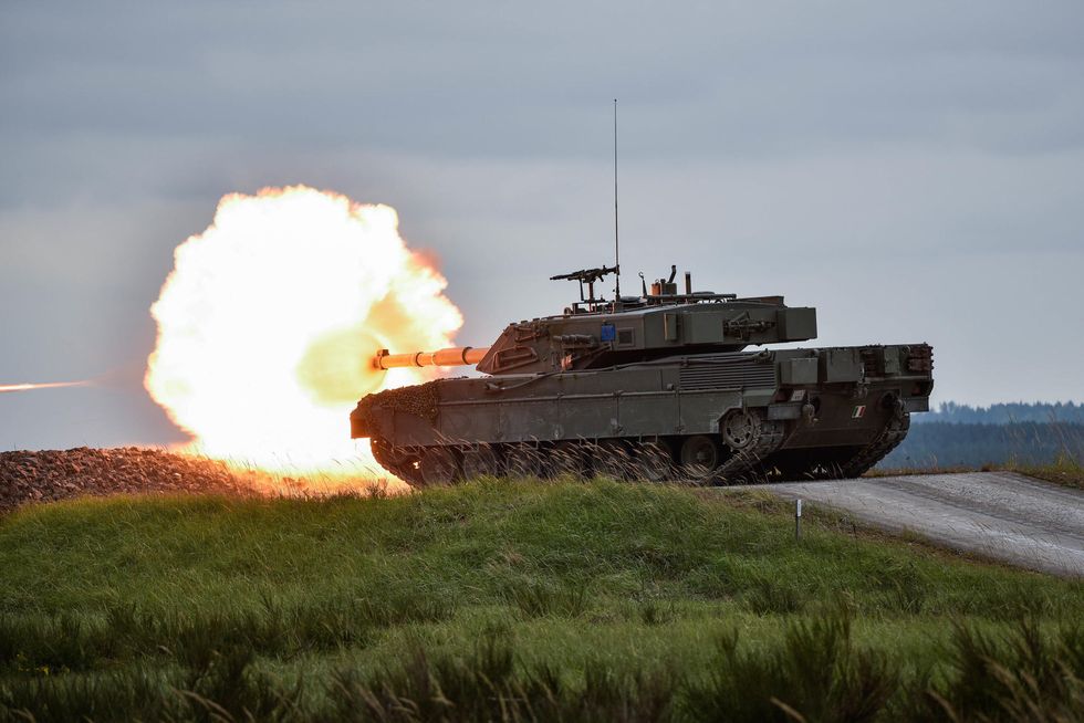 heptd6 an ariete italian tank fires at its target, during the strong europe tank challenge setc, at the 7th army joint multinational training commands grafenwoehr training area, grafenwoehr, germany, may 12, 2016 the setc is co hosted by us army europe and the german bundeswehr, may 10 13, 2016 the competition is designed to foster military partnership while promoting nato interoperability seven platoons from six nato nations are competing in setc   the first multinational tank challenge at grafenwoehr in 25 years for more photos, videos and stories from the strong europe tank challenge, go