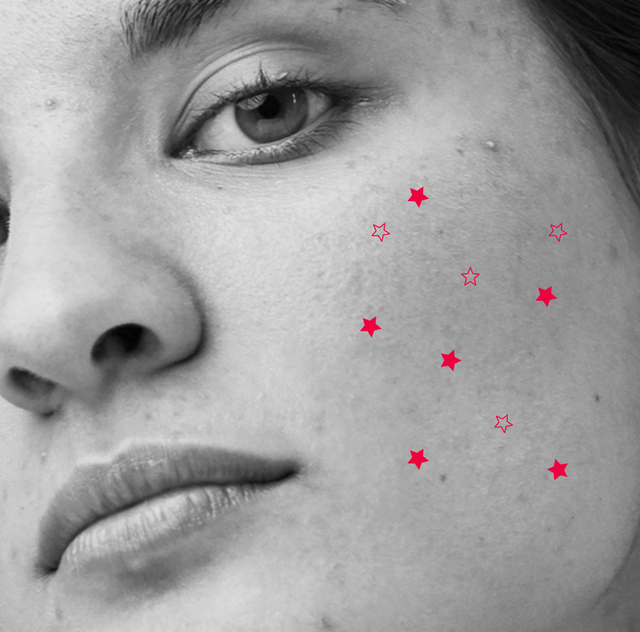 black and white photo of woman with pink star emojis on her face