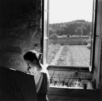 Artist Vincent van Gogh spent a year in a psychiatric hospital in SaintRmydeProvence France where he painted the landscapes he saw outside his window Today the hospital is still functioning and in this photo from the October 1997 issue a woman uses art to work through her mental illness