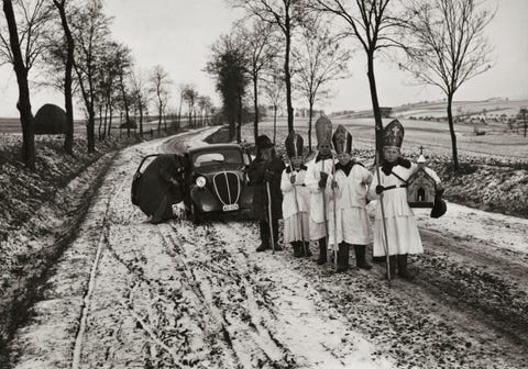 In this picture from the January 1938 issue young boys dress as wise men prophets and shepherds to sing Christmas carols across the countryside in northern Hungary