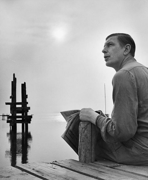 poet wh auden sitting on a dock