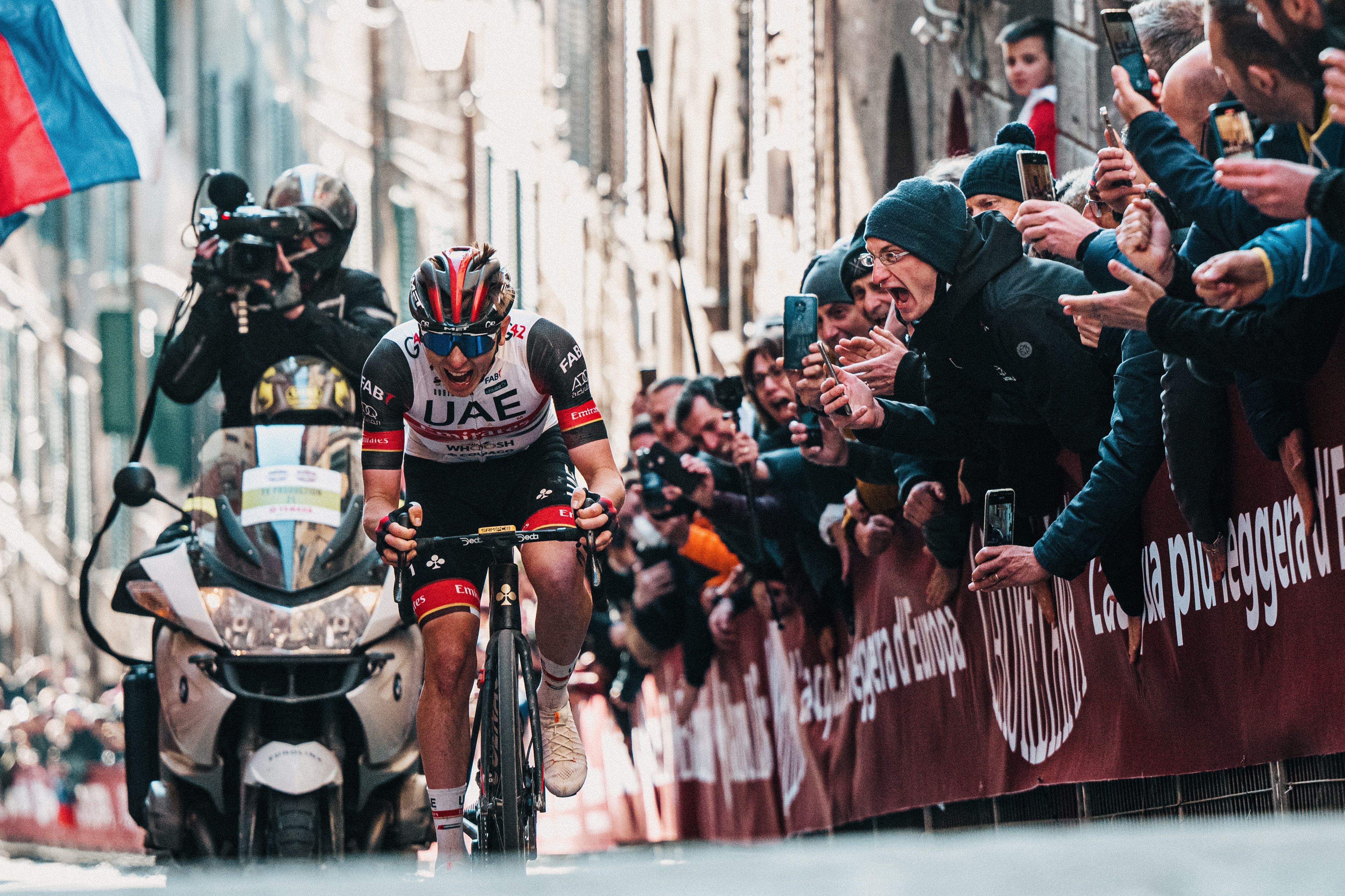 After a solo attack, Pogačar climbs the Via Santa Caterina on his way to win the 2022 Strade Bianche.