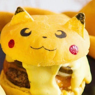 Stuffed toy, Toy, Yellow, Plush, Snout, Cat, Textile, Dish, Food, Junk food, 